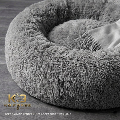 Calming dog bed close-up – deep calming center, ultra-soft shag fur, machine washable grey
